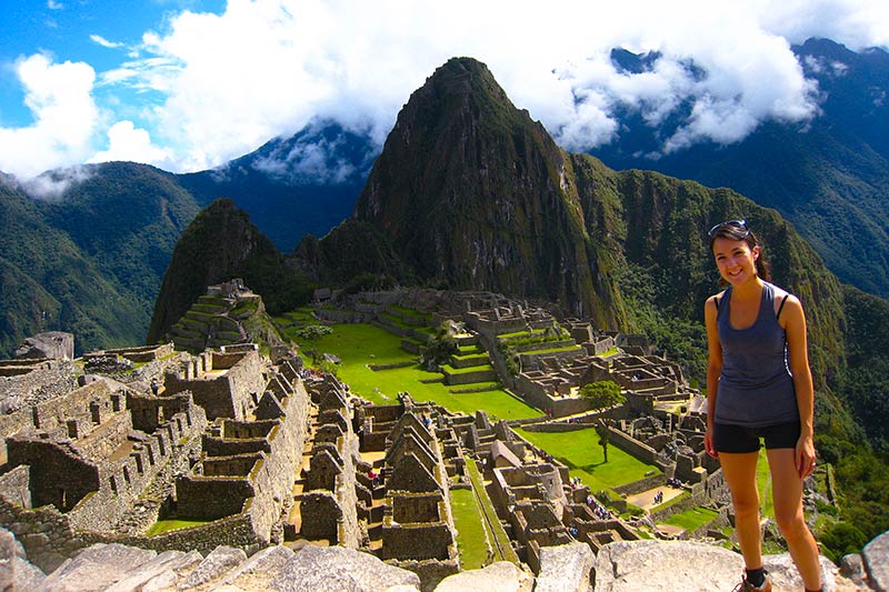 Young tourist visiting Machu Picchu