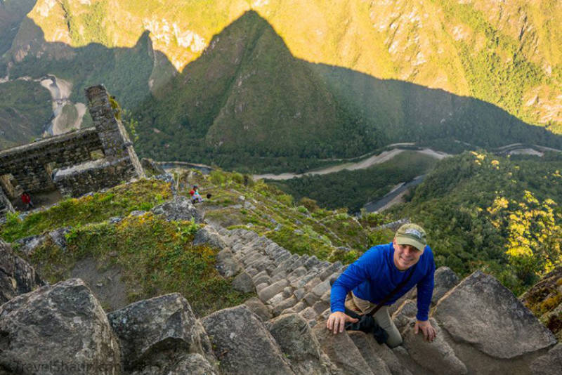 Tourist climbing up the steep stretch to Huayna Picchu