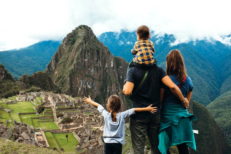 Parents and children enjoying the wonder of the world