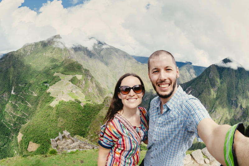 Tourists at the top of Huayna Picchu Mountain