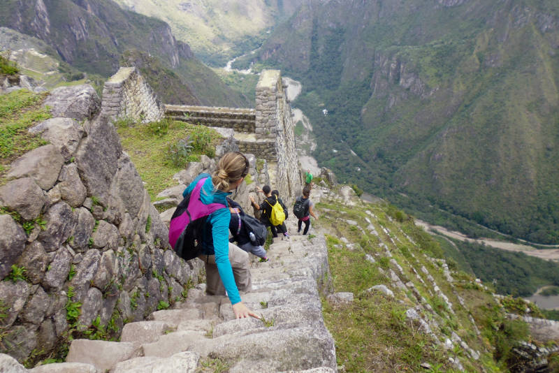 Tourists descending Huayna Picchu's death staircase