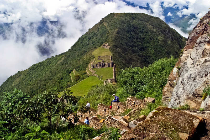 Tourists resting at the ruins of Choquequirao