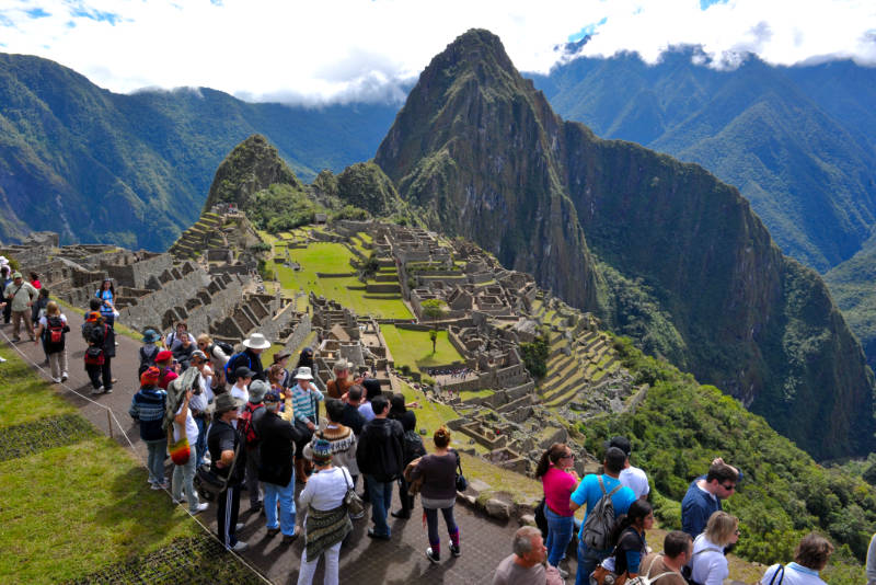 Visitors touring Machu Picchu ruins