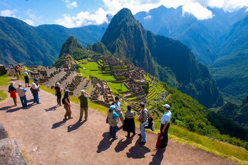 Tourists looking at the Inca citadel