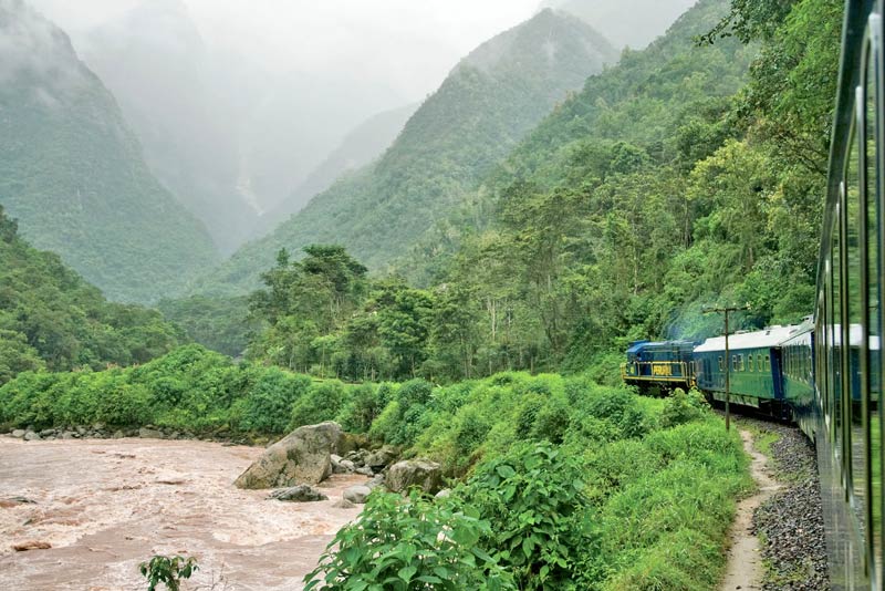 Traveling by train through the Cusco jungle