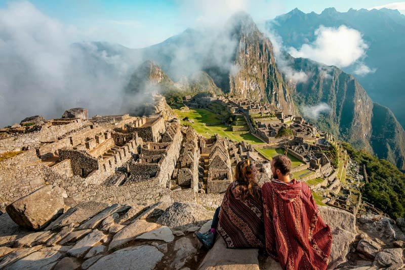 Tourist couple in Machu Picchu