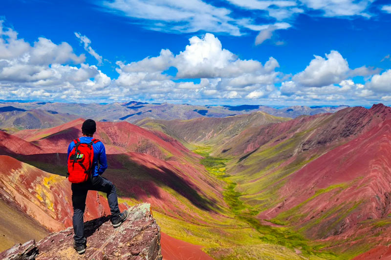 Tourist looking at the landscape in the Red Valley