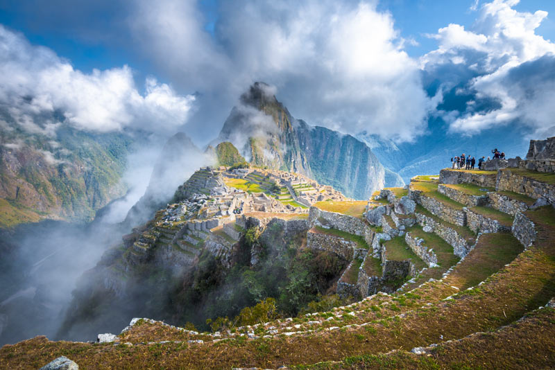 Panoramic view of the Inca citadel of Machu Picchu with mist